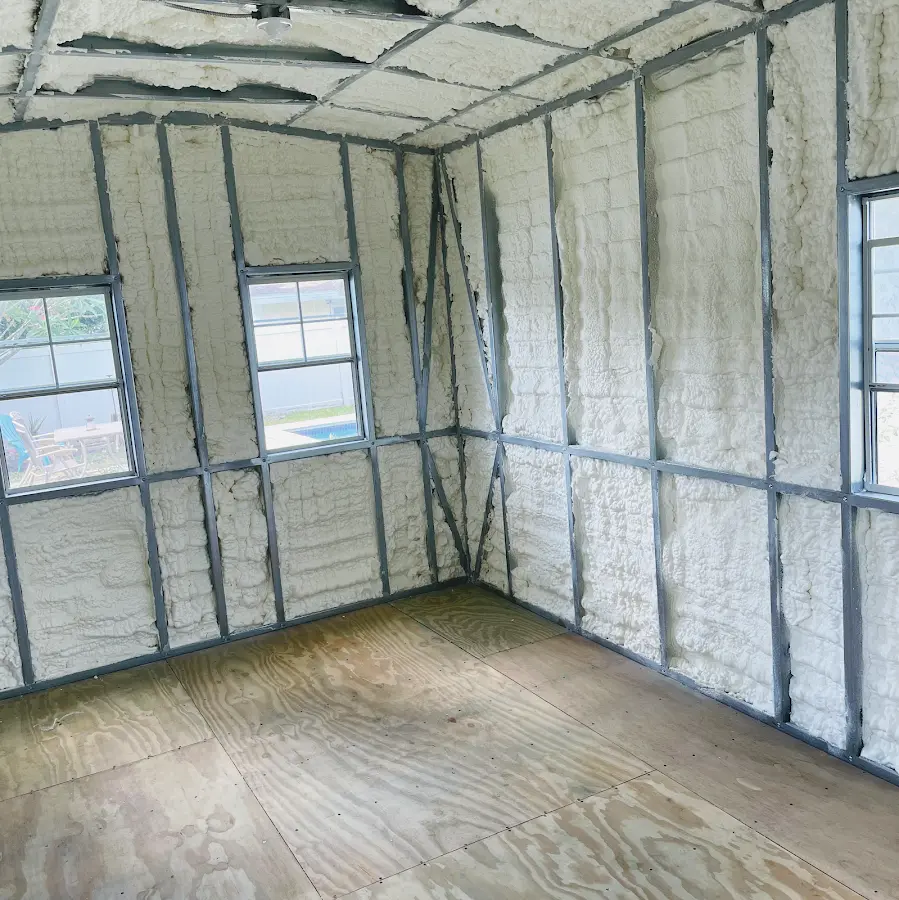 Closed-cell spray foam insulation applied to wall cavities in a residential project in St. Francis